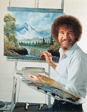 Bob Ross at ease in front of his easel.