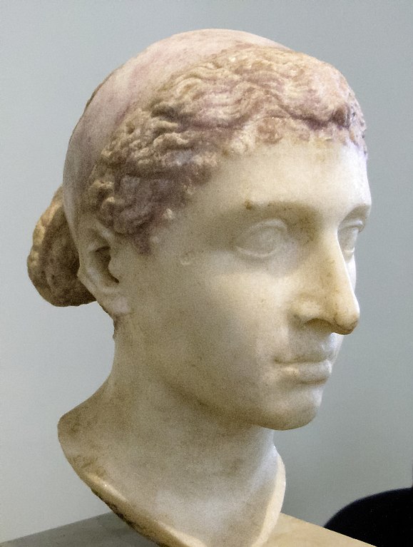 An ancient Roman bust of Ptolemaic ruler Cleopatra VII of Egypt wearing a royal diadem band over her hair; dated to the mid-1st century BC (i.e. around the time of her visit to Rome), it was discovered in a villa along the Via Appia. It is now located in the Altes Museum, Berlin, in the Antikensammlung Berlin collection.