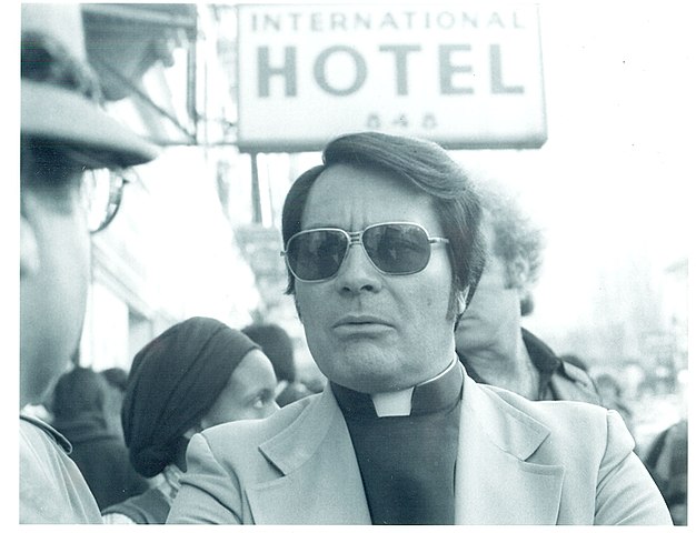 Rev. Jim Jones, 1977 at an anti-eviction rally in front of the International Hotel, Kearny and Jackson Streets, San Francisco Photo by Nancy Wong