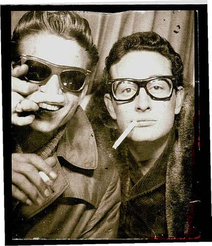 Buddy Holly and Waylon Jennings photographed in a photo-booth in Central Station, in New York City. 1959