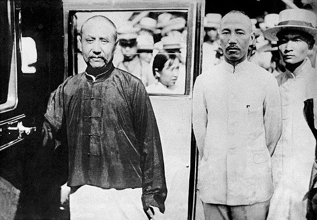 CHINA - JULY 31: General YEH HSI-SHAN, governor of Shanghai (left) leaving the Peking Hotel with General CHANG KAI-SHEK, President of the National Government, after having held talks with General FENG YU-SHIANG on July 31, 1929. (Photo by Keystone-France/Gamma-Keystone via Getty Images)
